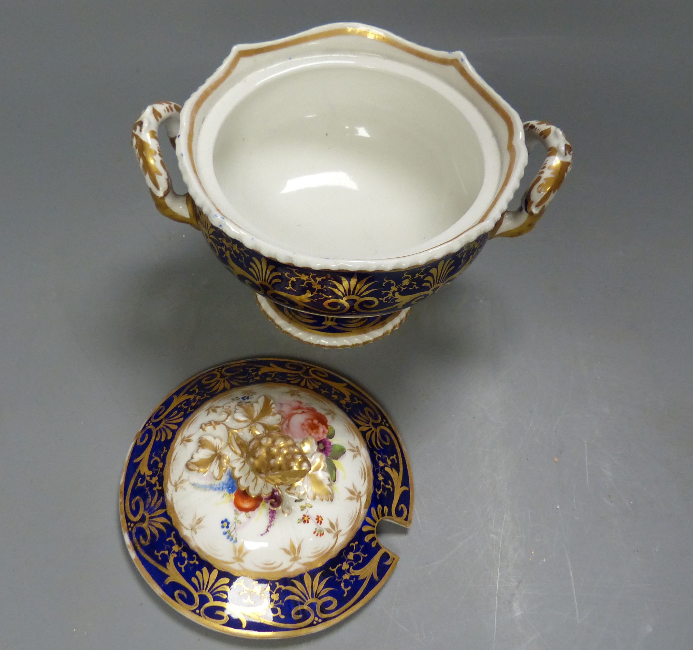 A group of English porcelain blue ground dessert wares, some damage, c.1825